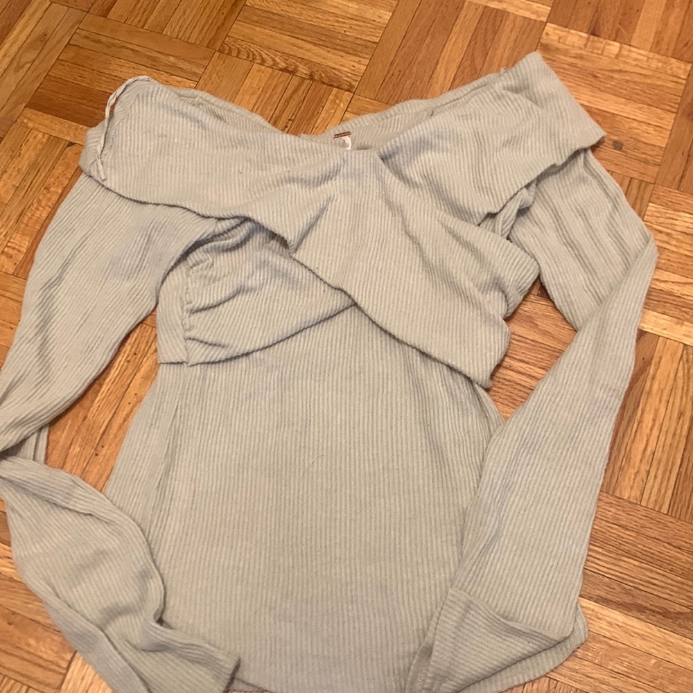 Free people. NWT. Oatmeal colored. Off the shoulder top. Size large.